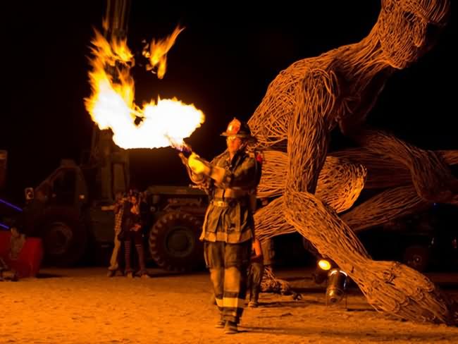 Setting fire to the burning man effigy