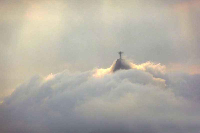 The clouds often rise to meet the statue